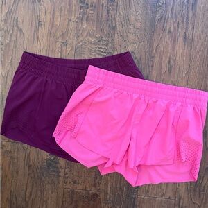 Two pair of Athleta Run With It Shorts | size M